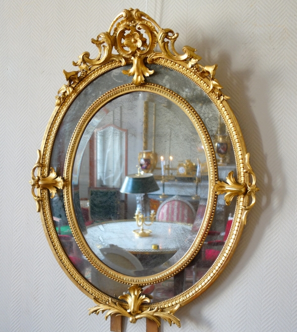 Gold leaf gilt wood oval mirror, mercury mirror, Napoleon III production