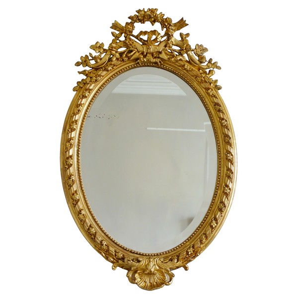 Grand miroir ovale de style Louis XVI en bois doré à la feuille d'or époque Napoléon III - 95,5cm x 60cm