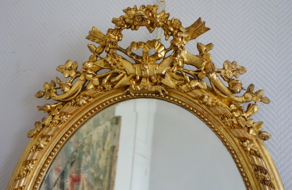 Louis XVI style oval gilt wood mirror, Napoleon III period - 19th century - 95.5cm x 60cm