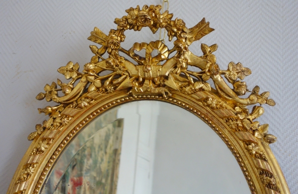 Grand miroir ovale de style Louis XVI en bois doré à la feuille d'or époque Napoléon III - 95,5cm x 60cm