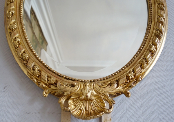 Grand miroir ovale de style Louis XVI en bois doré à la feuille d'or époque Napoléon III - 95,5cm x 60cm