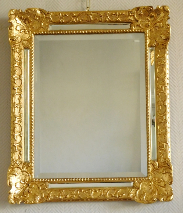 Miroir à pare-closes en bois doré d'époque Louis XIV, glace au mercure