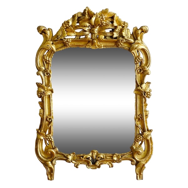 Miroir en bois doré, glace au mercure, travail Provencal d'époque Louis XV - Transition