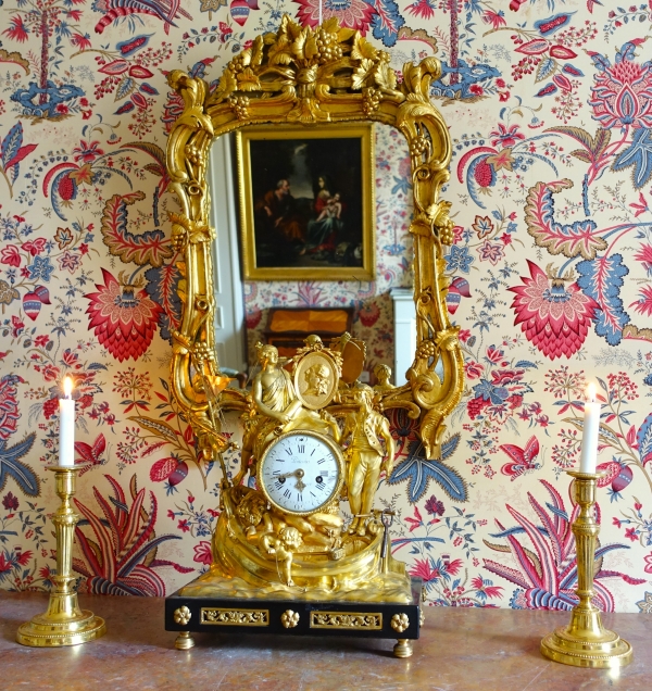 Miroir en bois doré, glace au mercure, travail Provencal d'époque Louis XV - Transition