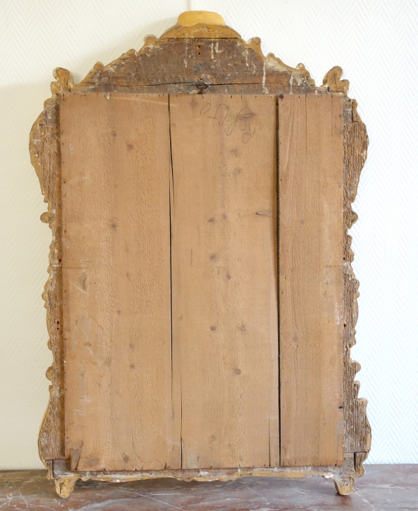 Miroir d'époque Louis XV en bois doré richement sculpté, travail provençal - 103cm x 73cm