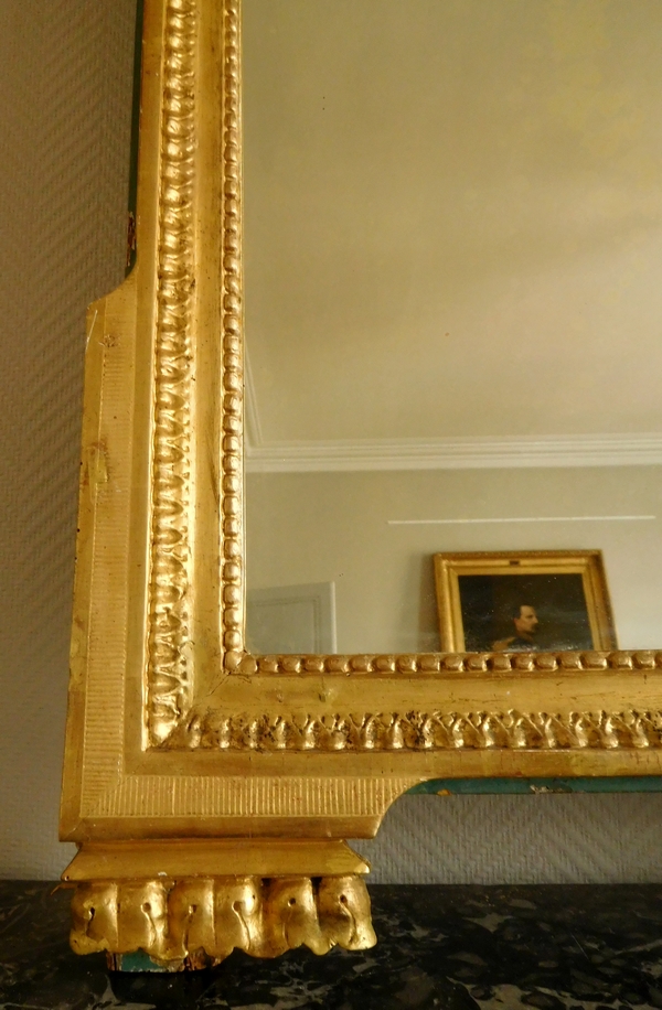 Grand miroir en bois doré, glace au mercure, travail Provençal d'époque Louis XVI - 76cm x 146cm
