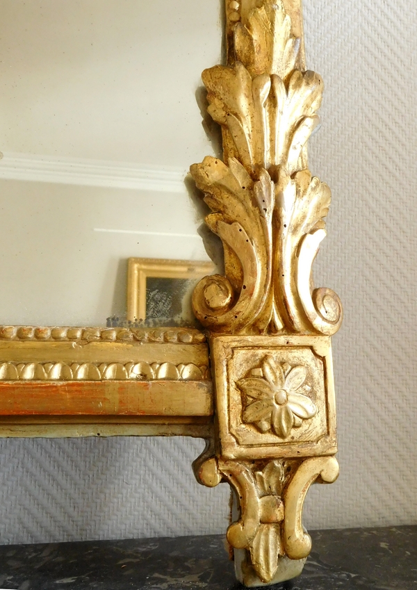 Grand miroir en bois doré, glace au mercure, travail provençal d'époque Louis XVI