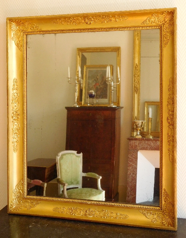 Miroir d'époque Empire en bois doré, glace au mercure