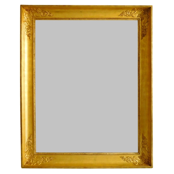 Miroir aux cygnes d'époque Empire Restauration en bois doré - 105cm x 84cm