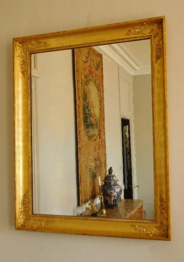 Miroir aux cygnes d'époque Empire Restauration en bois doré - 105cm x 84cm