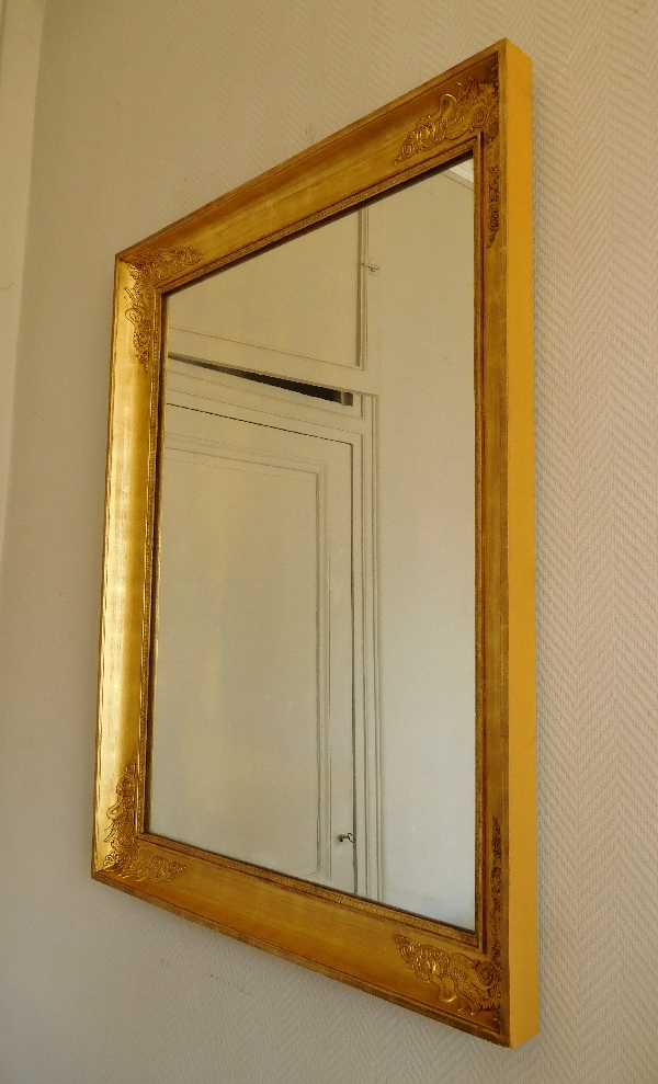 Miroir aux cygnes d'époque Empire Restauration en bois doré - 105cm x 84cm