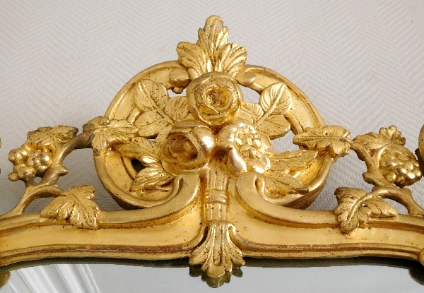 Miroir en bois doré, glace au mercure, travail Provencal d'époque Louis XV - Transition