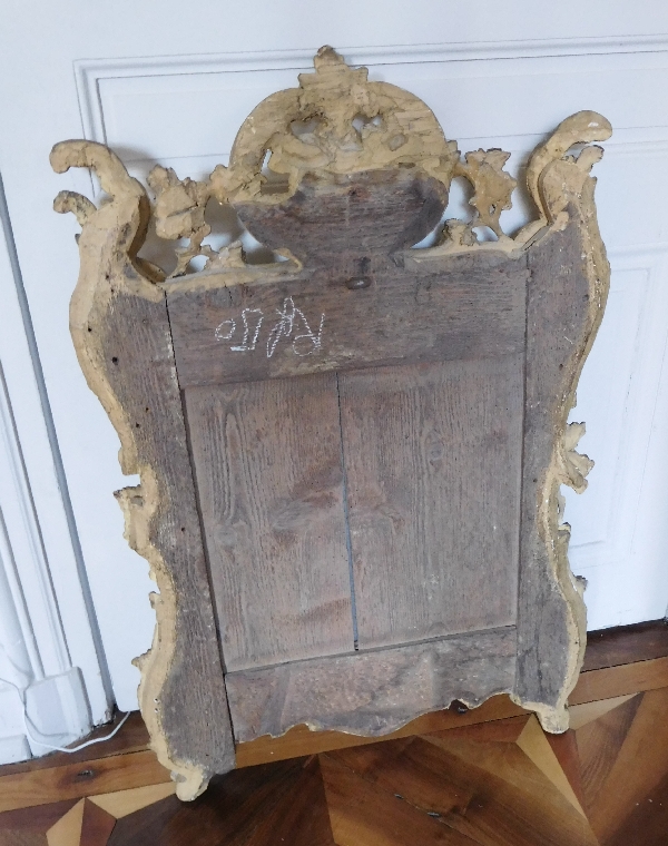 Miroir en bois doré, glace au mercure, travail Provencal d'époque Louis XV - Transition