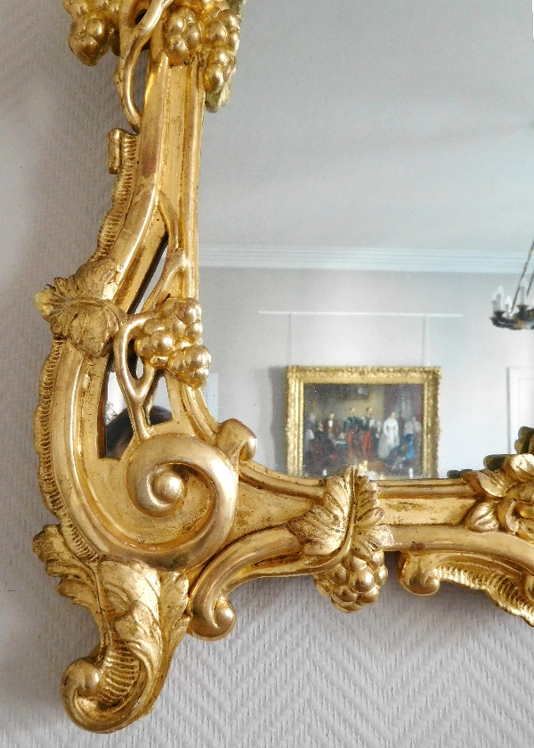 Miroir en bois doré, glace au mercure, travail Provencal d'époque Louis XV - Transition