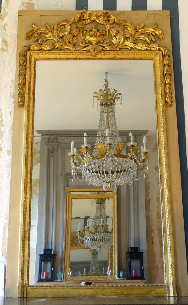 Trumeau, miroir de boiserie d'époque Louis XVI en bois laqué et doré, glace au mercure