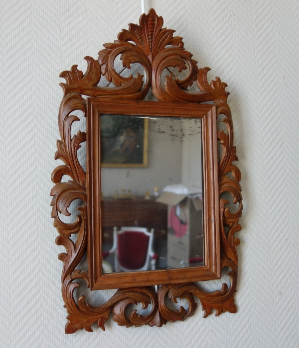 Pair of late 17th century sculpted Bagard wood frame, mercury mirror, Louis XIV period