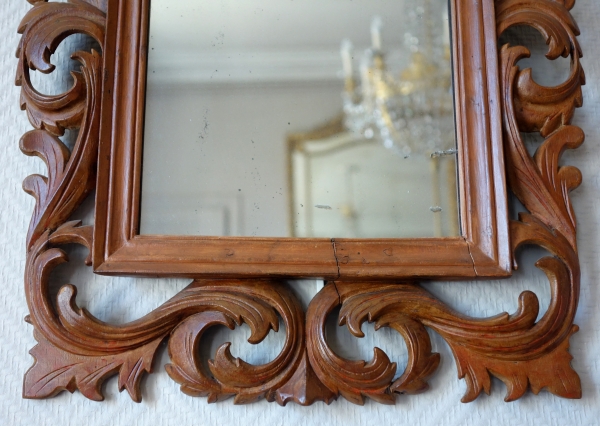 Pair of late 17th century sculpted Bagard wood frame, mercury mirror, Louis XIV period