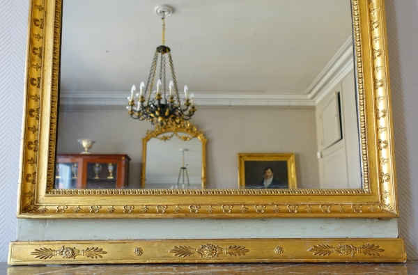 Trumeau, miroir de boiserie d'époque Empire en bois laqué et doré, glace au mercure