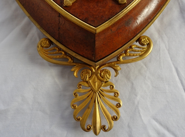 Empire burl thuja and ormolu crest-shaped clock, early 19th century