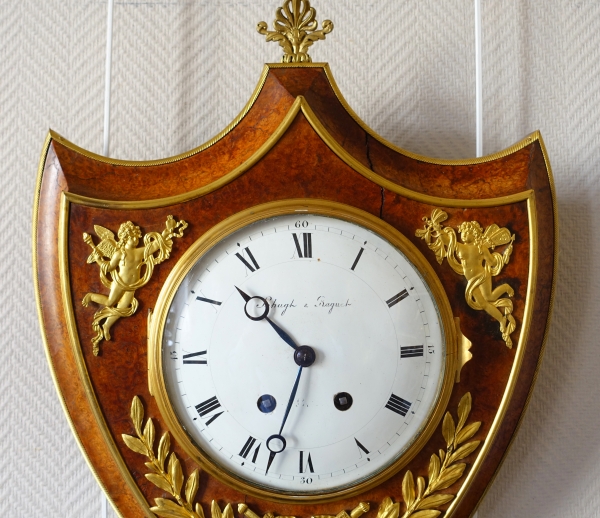 Empire burl thuja and ormolu crest-shaped clock, early 19th century