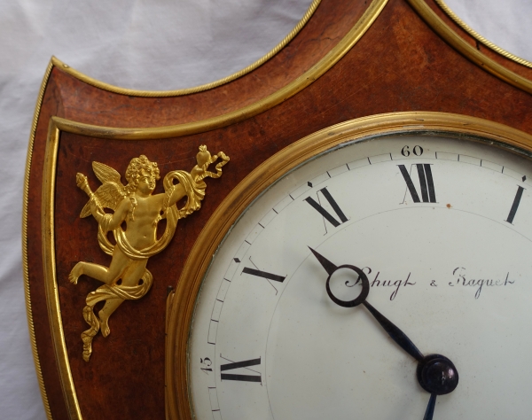 Empire burl thuja and ormolu crest-shaped clock, early 19th century