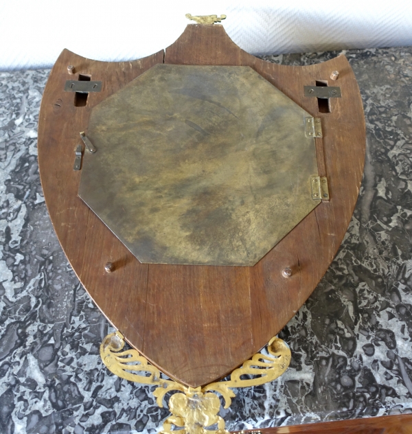 Empire burl thuja and ormolu crest-shaped clock, early 19th century