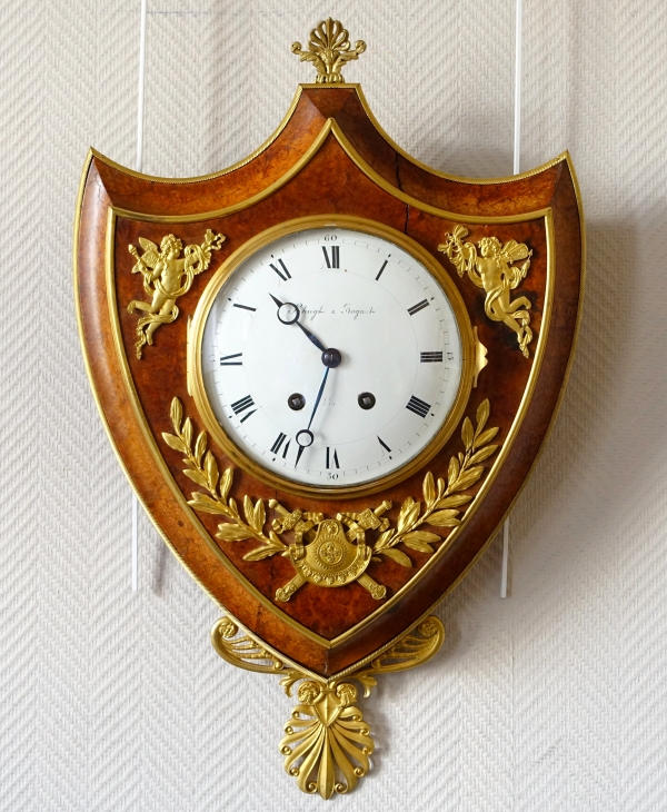 Empire burl thuja and ormolu crest-shaped clock, early 19th century