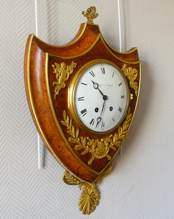 Empire burl thuja and ormolu crest-shaped clock, early 19th century