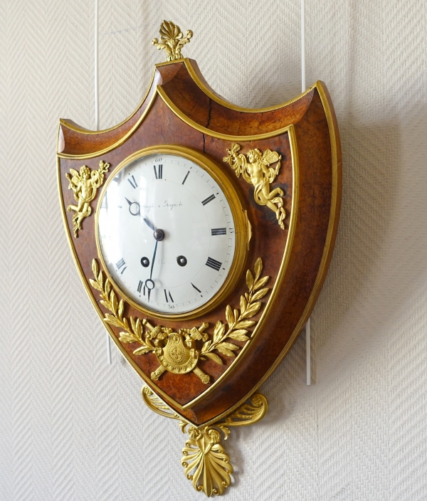 Empire burl thuja and ormolu crest-shaped clock, early 19th century