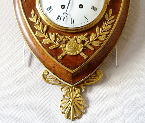 Empire burl thuja and ormolu crest-shaped clock, early 19th century