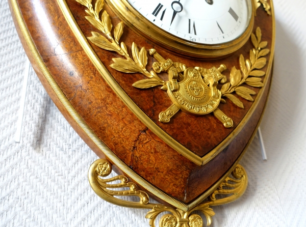 Empire burl thuja and ormolu crest-shaped clock, early 19th century