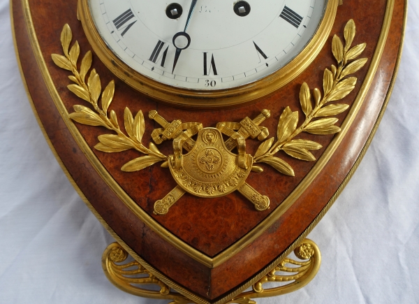 Empire burl thuja and ormolu crest-shaped clock, early 19th century