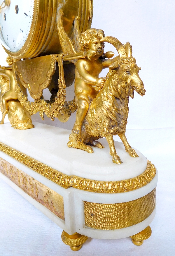 Louis XVI style ormolu and marble clock, bacchante and goats