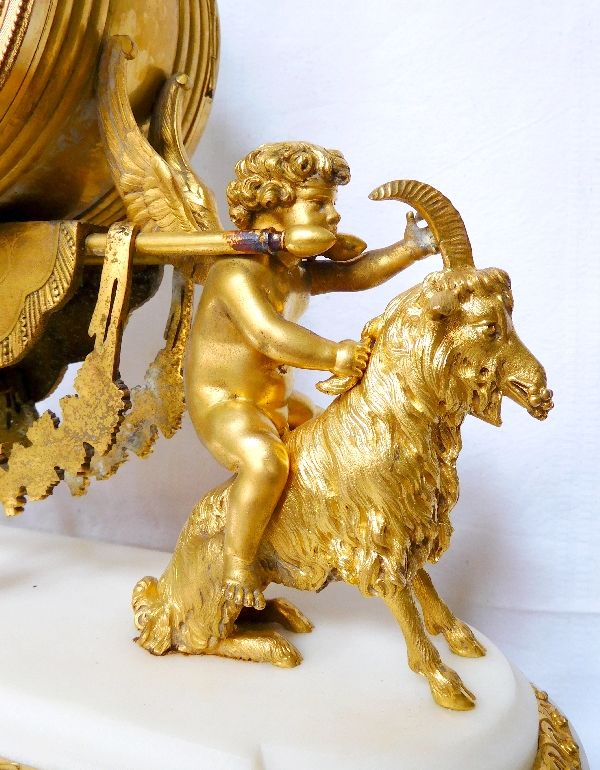 Louis XVI style ormolu and marble clock, bacchante and goats