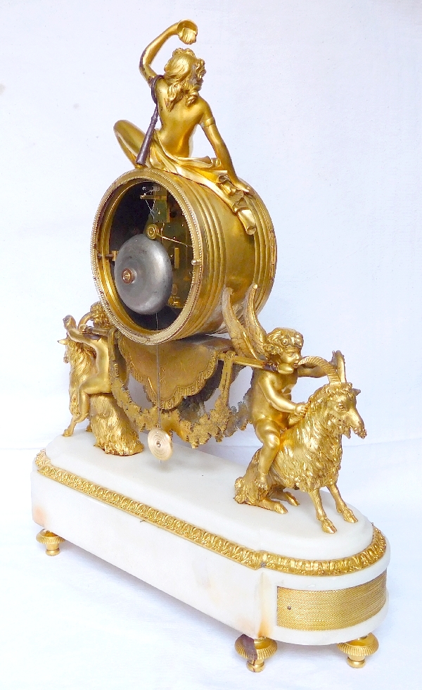 Louis XVI style ormolu and marble clock, bacchante and goats