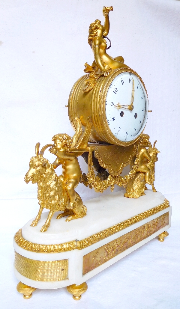 Louis XVI style ormolu and marble clock, bacchante and goats