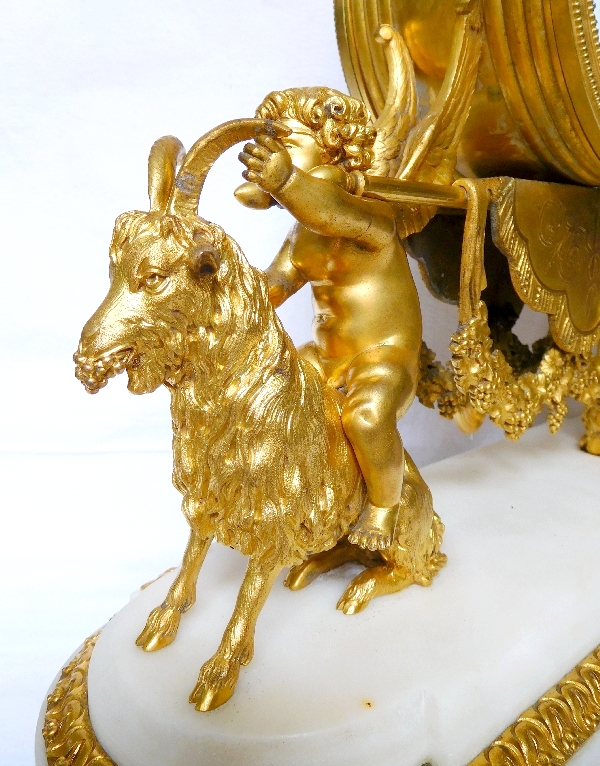 Louis XVI style ormolu and marble clock, bacchante and goats