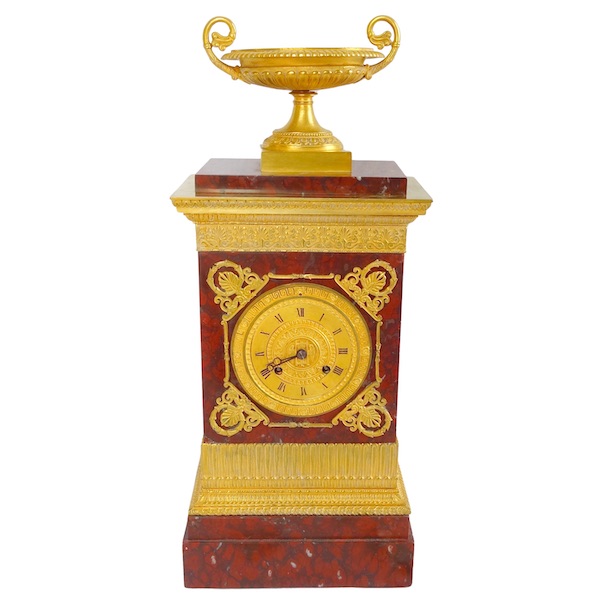 Tall ormolu and red marble Empire clock, early 19th century circa 1815-1820