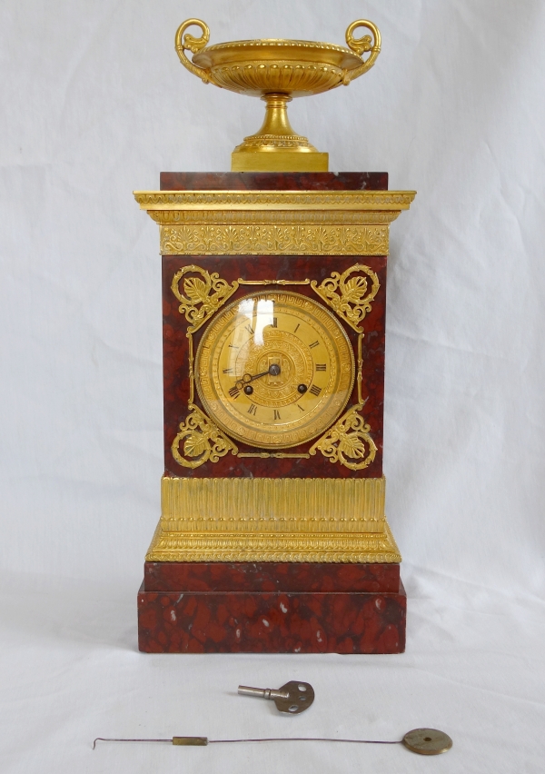 Tall ormolu and red marble Empire clock, early 19th century circa 1815-1820