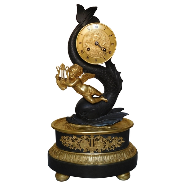 Empire clock, ormolu and patinated bronze, dolphin and putti, 19th century (circa 1820)