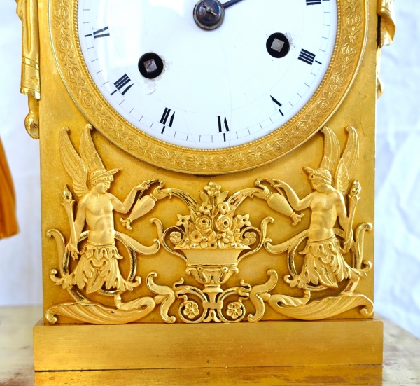 Pendule en bronze ciselé et doré d'époque Empire - allégorie du lever du jour ou le matin