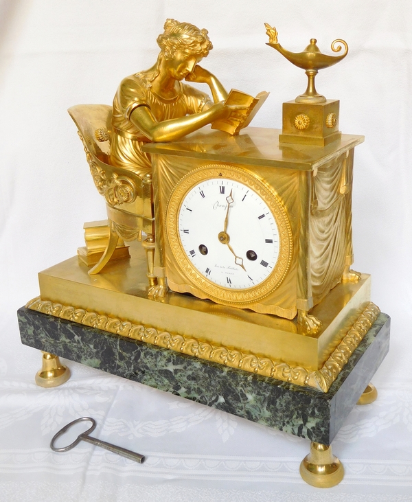 Pendule La Liseuse, d'après Reiche par Claude Galle & Champion, bronze doré, époque Empire