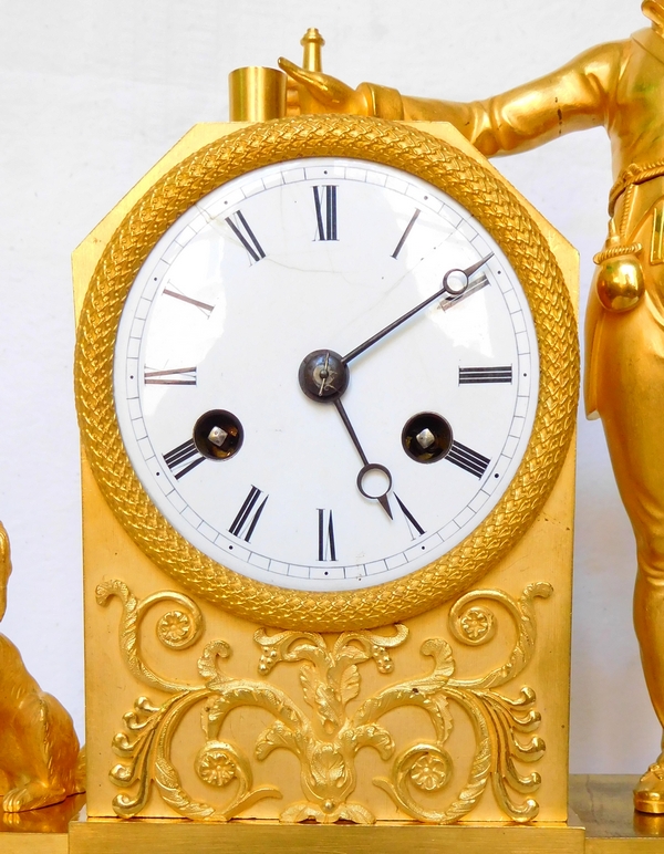 Empire ormolu clock picturing a hunter, early 19th century