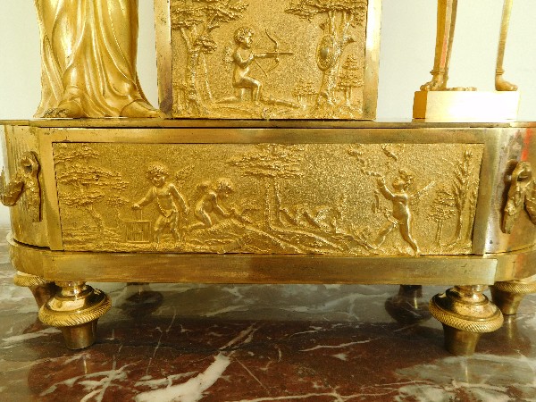 Pendule Empire en bronze doré, allégorie de la naissance du Roi de Rome