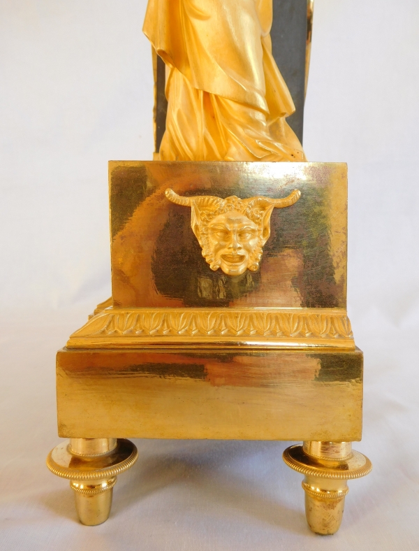 Ravrio : Empire patinated bronze and ormolu clock, mercury gilt, early 19th century - signed