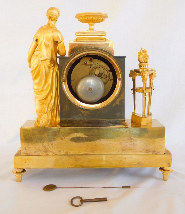 Ravrio : Empire patinated bronze and ormolu clock, mercury gilt, early 19th century - signed