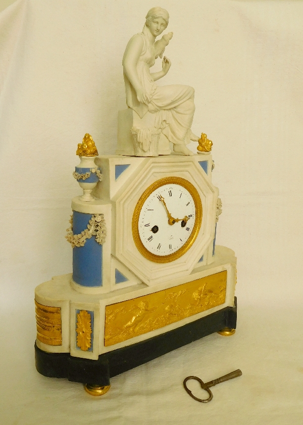 Late 18th century biscuit porcelain & ormolu clock : the spinner - allegory of destiny