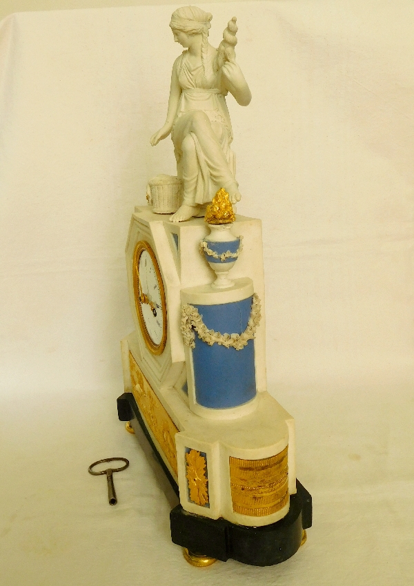 Late 18th century biscuit porcelain & ormolu clock : the spinner - allegory of destiny