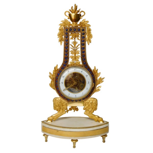 Pendule squelette d'époque Louis XVI Directoire en marbre et bronze doré