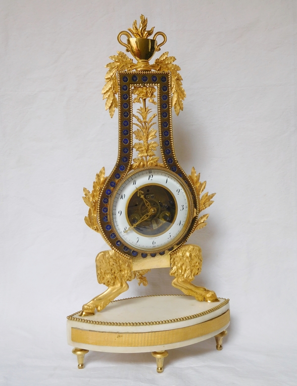 Pendule squelette d'époque Louis XVI Directoire en marbre et bronze doré